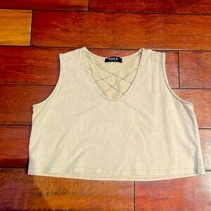 Super cute sleeveless crop top with rhinestone detail